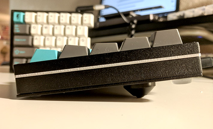 65% keyboard sitting on a table